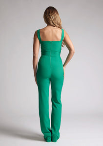Back image of a model wearing an emerald  jumpsuit with a sweetheart neckline, wide straps and a keyhole cut-out detail under bust, this style is finished with a wide leg. The style featured is Vesper Collette Emerald Jumpsuit.